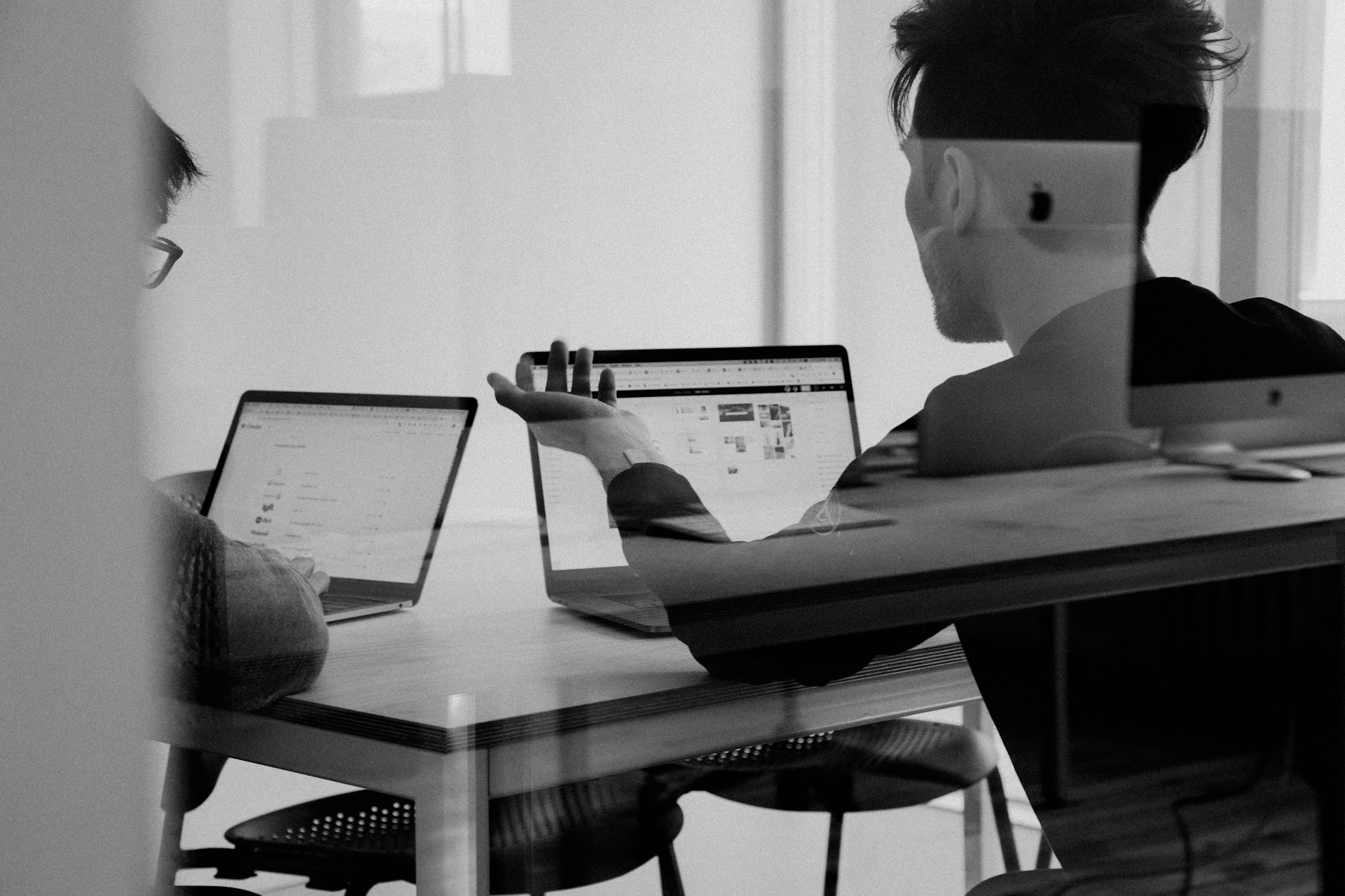 Xenture - Virtual Desktop Consultancy meeting with two laptops.
